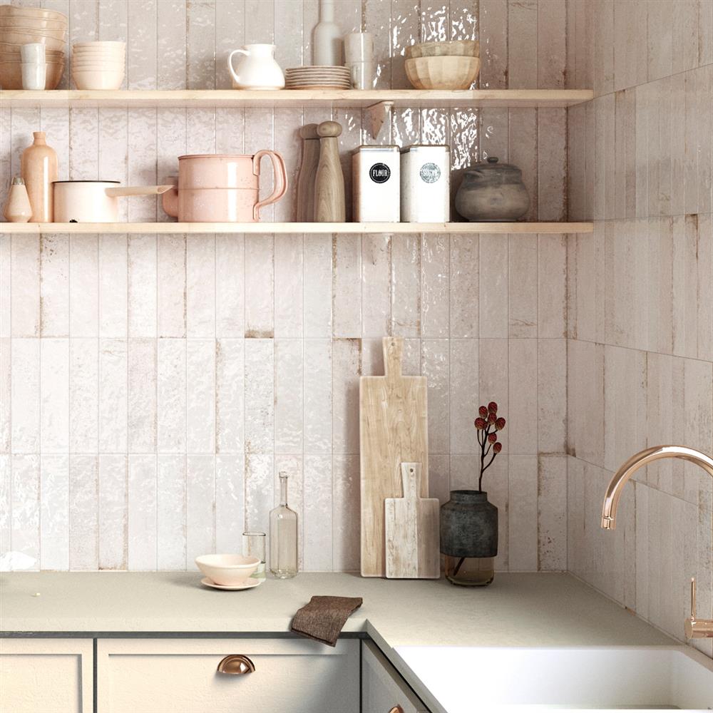 Antique-effect white metro tiles on a kitchen splashback